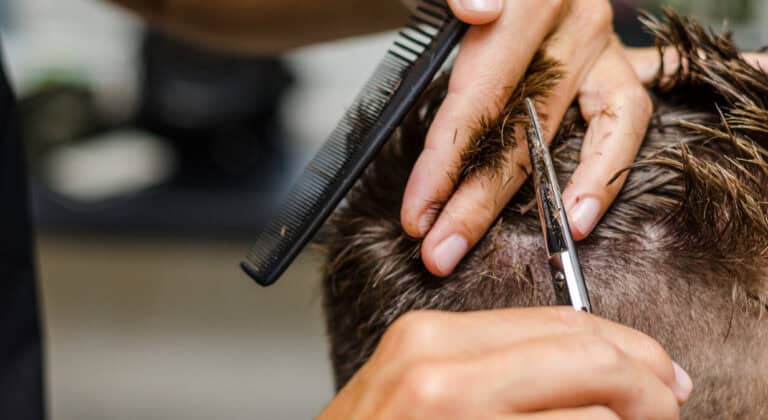 Men's hair cutting scissors in a beauty salon